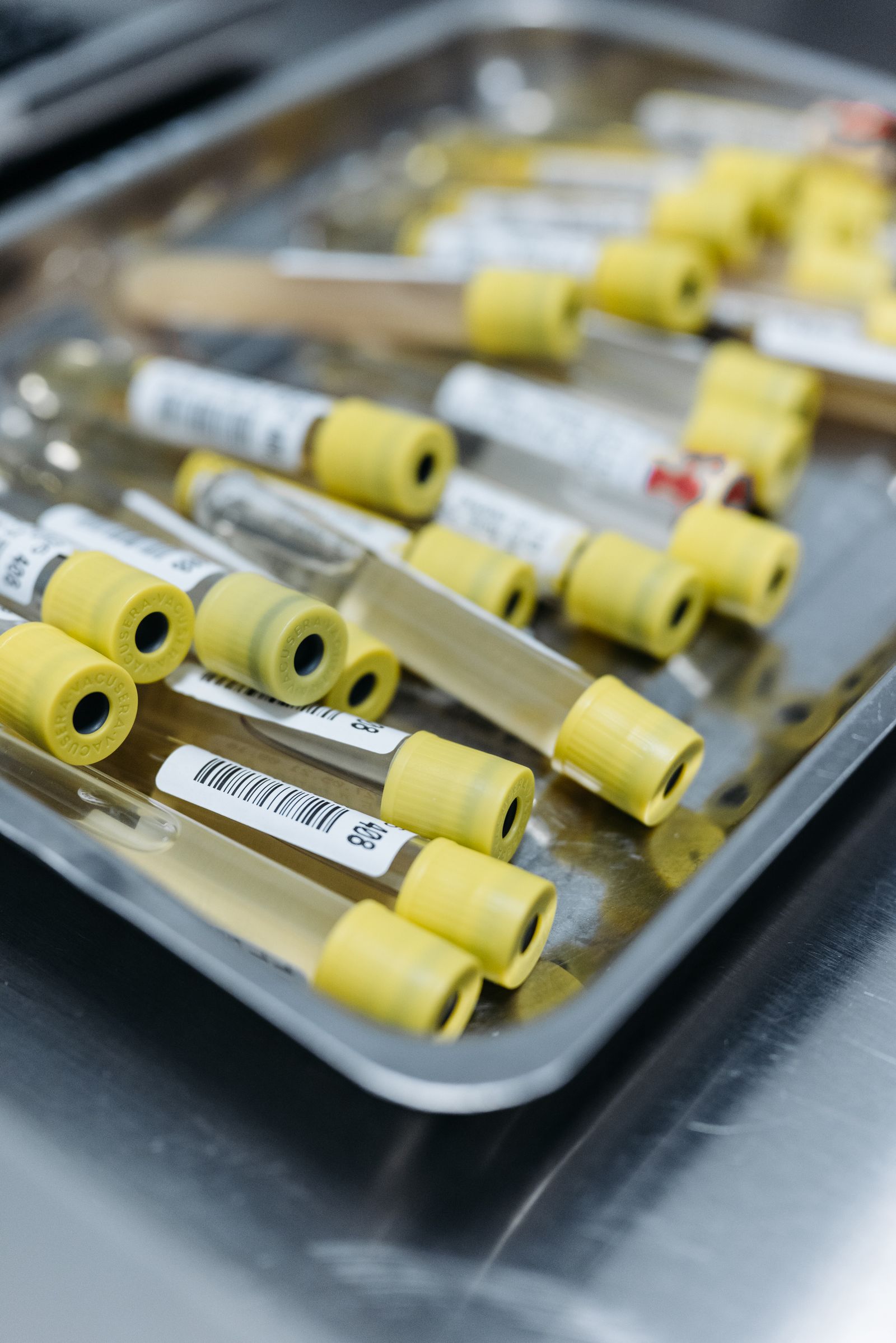 Research peptide vials on a laboratory tray